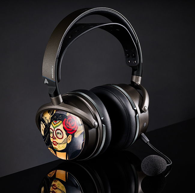 Stylish black gaming headset with colorful sugar skull design and detachable microphone, perfect for immersive gameplay.